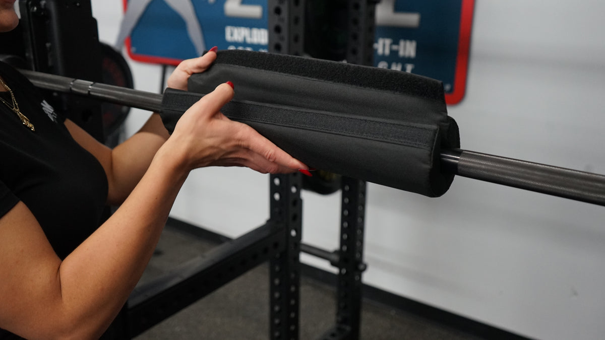 Gronk Fitness bar pad being attached to barbell