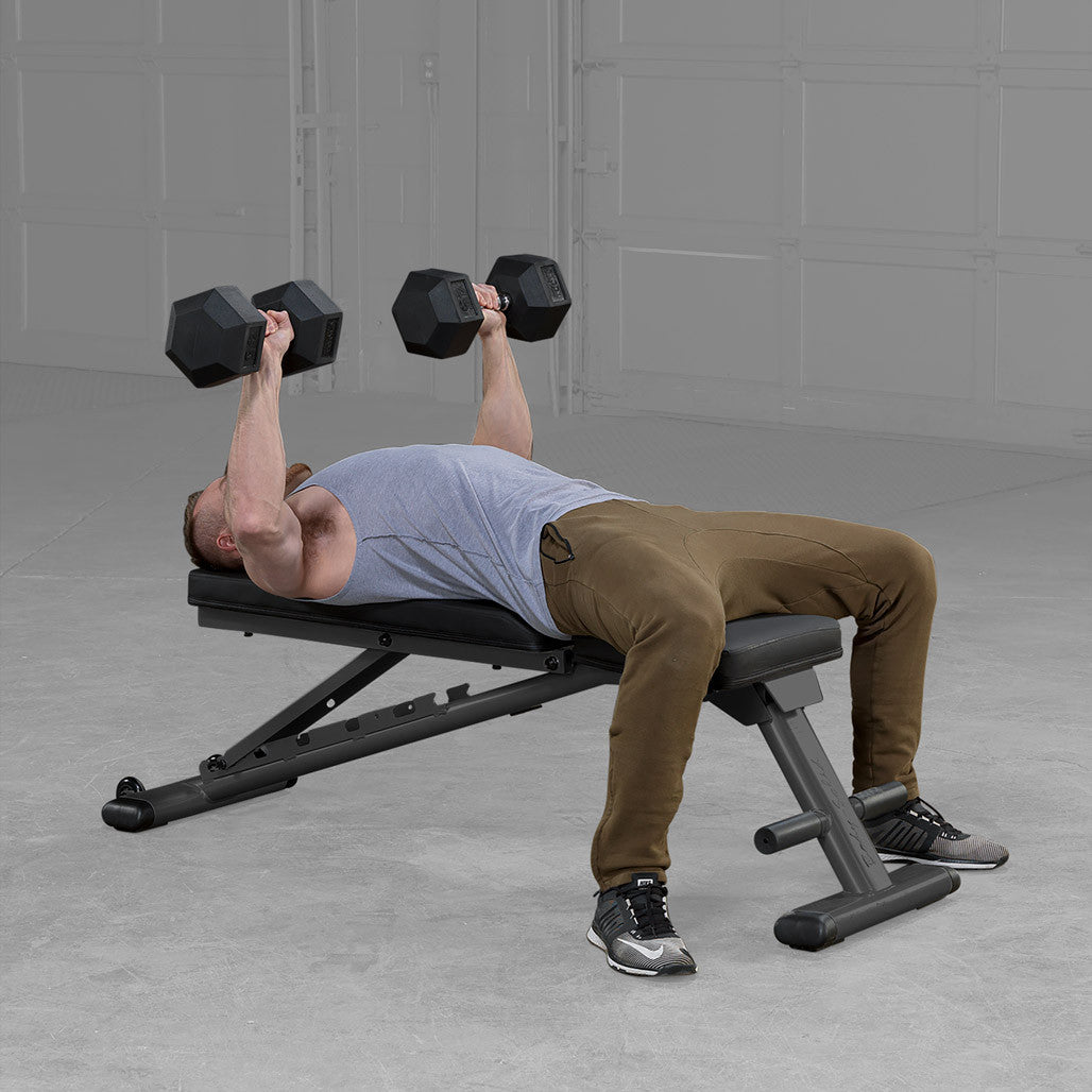 Body-Solid GFID225B bench with user performing bench press