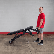 Body Solid SFID425 bench being wheeled by a person