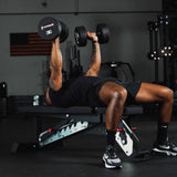 Dynamic Titan Stand Up Bench in use with dumbbells