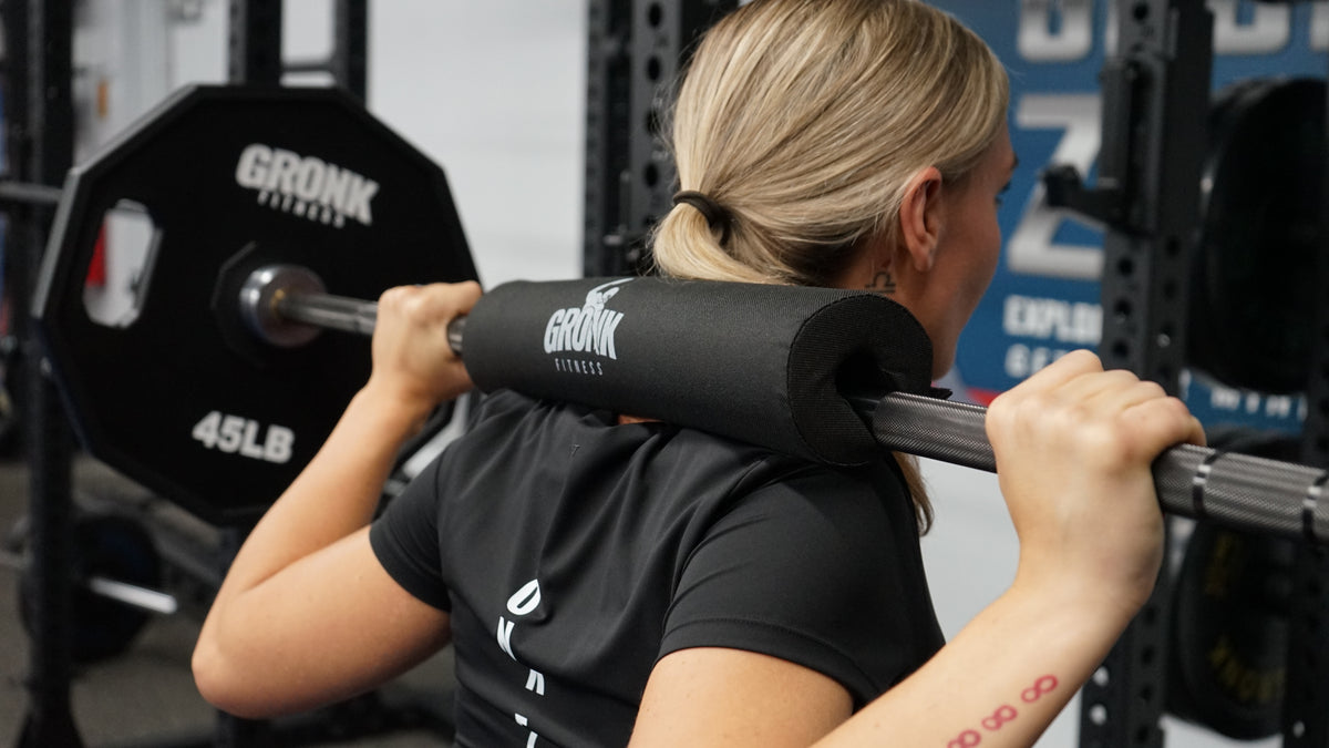 Gronk Fitness bar pad in use during squat exercise