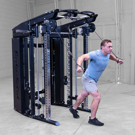 Body-Solid GSFR100 in use with man performing cable exercise