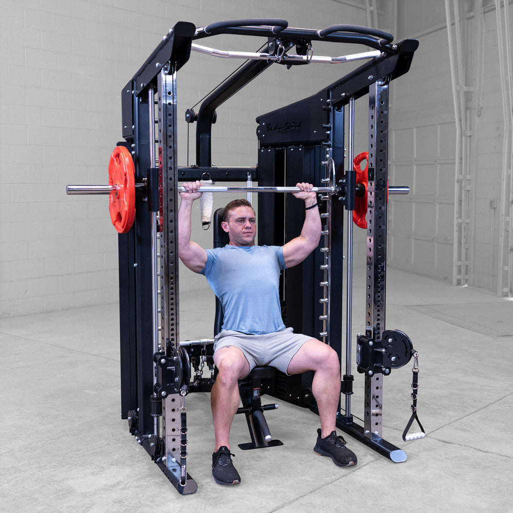 Body-Solid GSFR100 with man performing shoulder press