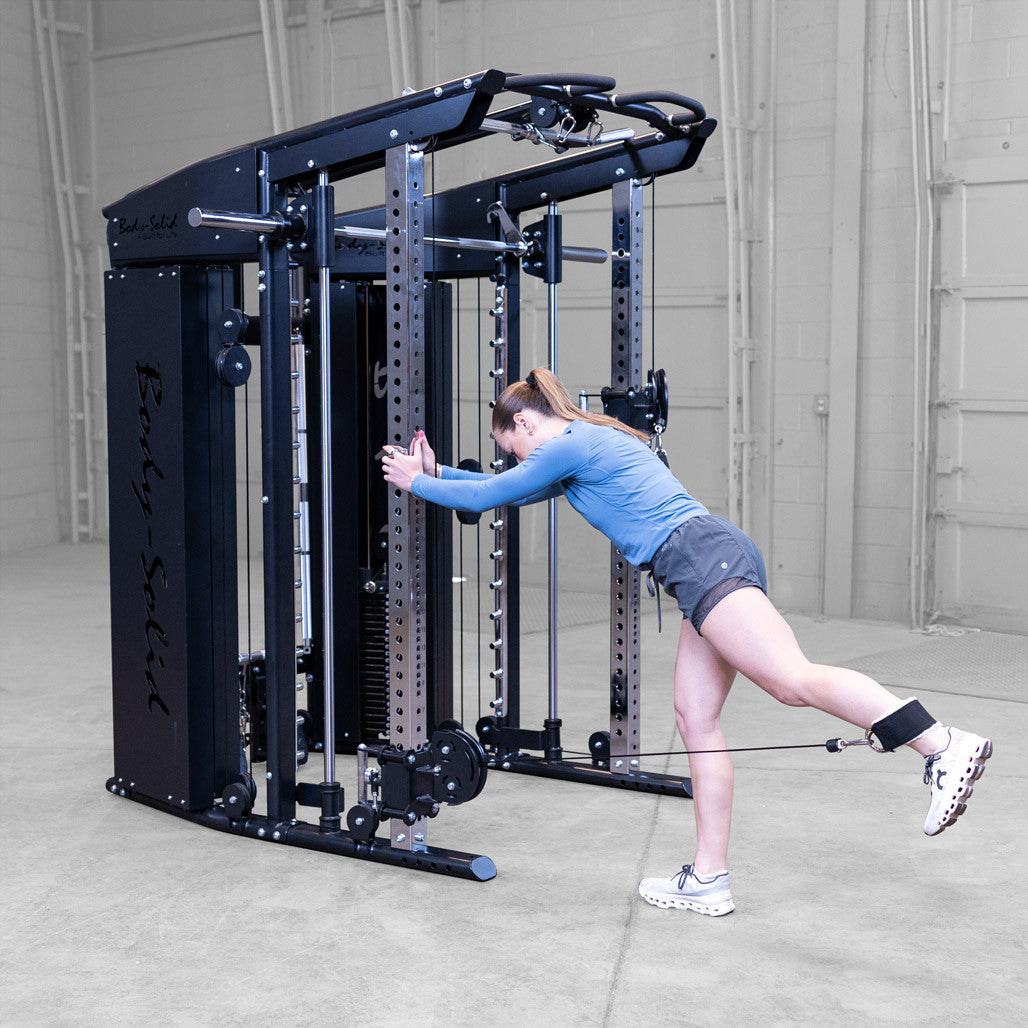 Body-Solid GSFR100 with woman performing leg kickback