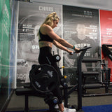 Gronk Fitness Plate Loaded Vertical Hip Thrust Gronk Fitness Products Selectorized, single stack, MTS, Hammer, assembled NicoleRoggowVerticalHipThrust-Standing_1800x1800_73514dff-fef3-4304-8d11-a7ddf88da5f2