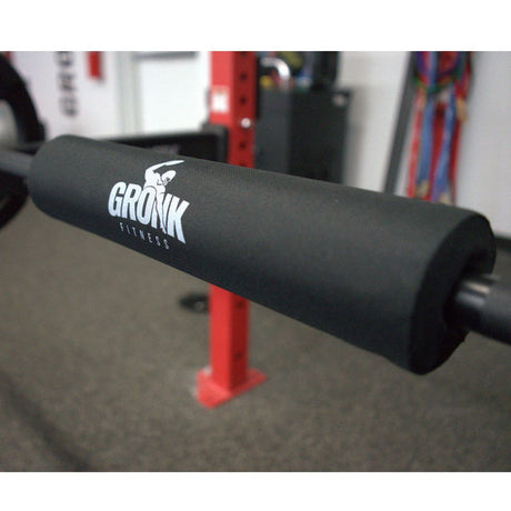 Gronk Fitness bar pad on barbell in gym setting