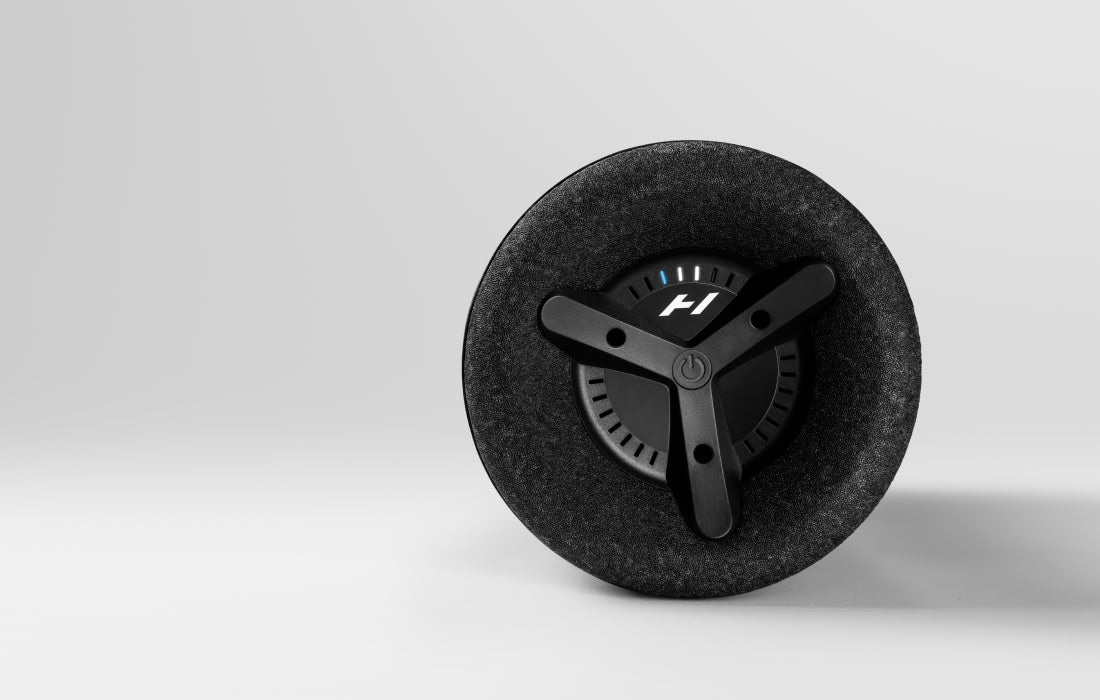 End view of the vibration roller showing the three-arm control and logo