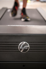 Life Fitness logo badge on the front of the Run CX treadmill